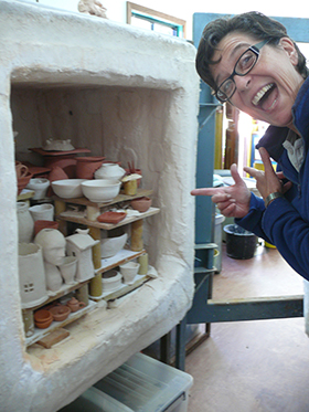 First firing-Heather Kimber checks the kiln!